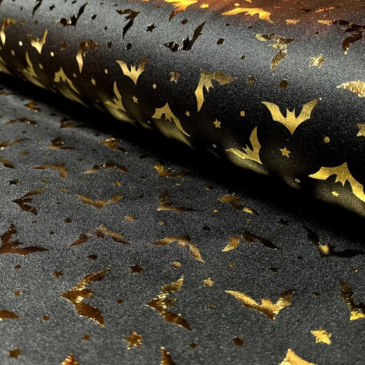 Polyester Jersey Tyg 145cm 069 - Svart med guldfladdermöss